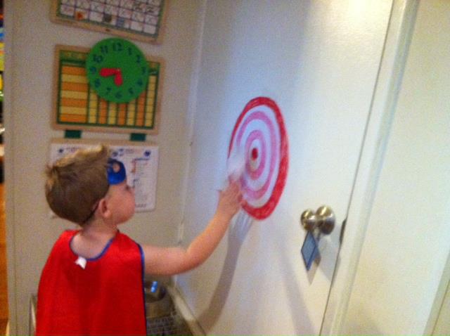 Andrew trying to hit the bullseye. Teaching about sin--we all miss the mark of perfection.
